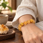 Citrine gold bracelet worn in a quiet setting