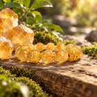Citrine bracelet with crystals outdoors