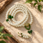White Jade 108 Mala with Jade Butterfly - 02_material_natural_stilllife
