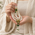 White Jade 108 Mala with Jade Butterfly - 03_prayer_hands_lifestyle