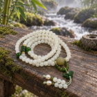 White Jade 108 Mala with Jade Butterfly - 05_outdoor_zen_bench